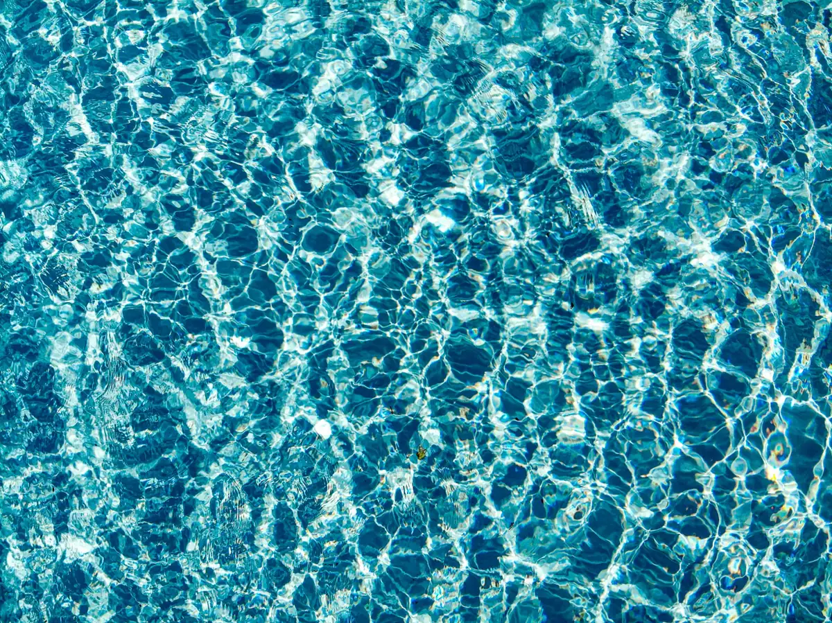 Crystal clear swimming pool maintained by Trueblue Pool Co. in Hattiesburg, MS